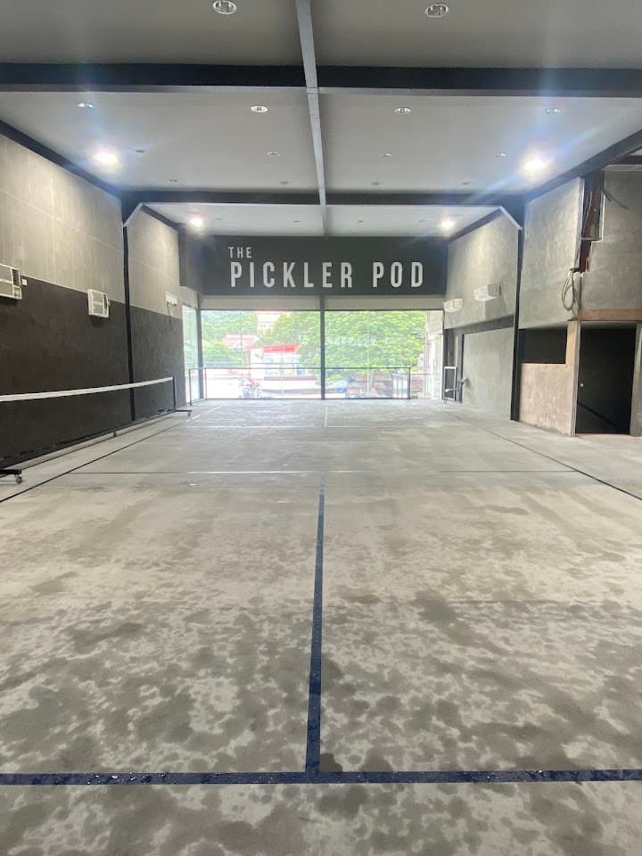 The Pickler Pod pickleball court at Infront of seaoil, Richmond Subdivision, 2nd Floor Milk & Brew M.L Quezon Ave beside Jollibee, Angono, 1930 Rizal | PickleBoard